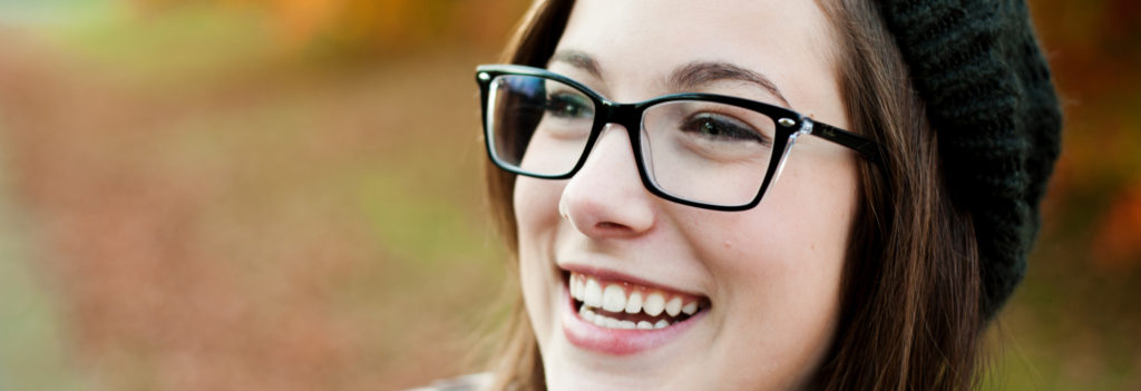 Girl in beanie wearing glasses